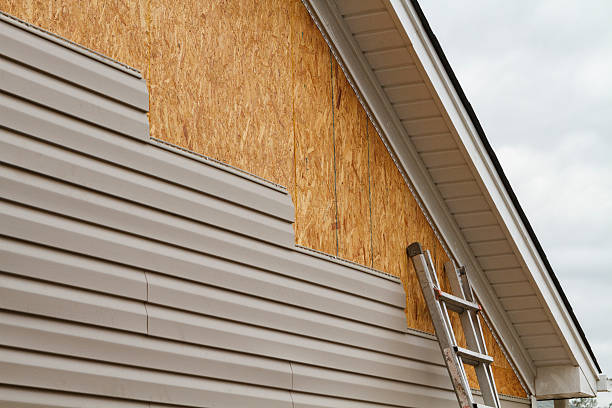 Professional Siding Installation technician working in Springdale, PA